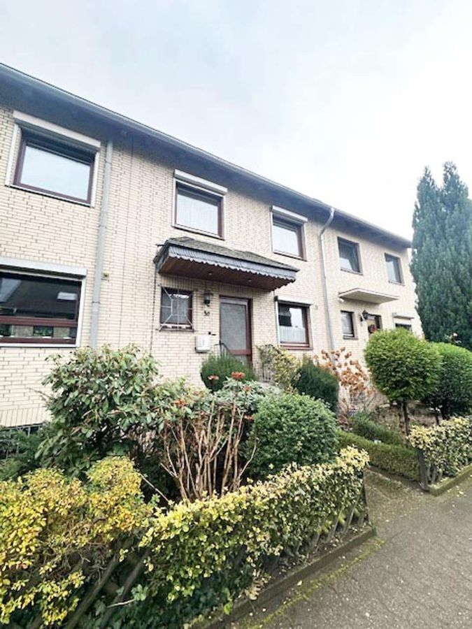 Eingang Vorderansicht - Solides Reihenhaus mit Garage in ruhiger Lage von Garbsen-Berenbostel