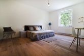 Schlafzimmer Beispiel - 3-Zimmer-Wohnung mit Garten